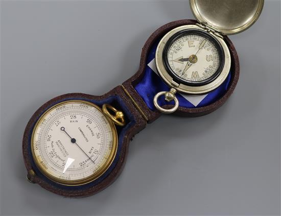 A pocket barometer by Armstrong, Manchester, cased and a nickel cased watch type pocket barometer (2)